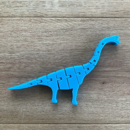 a picture of the brachiosaurus articulated toy in blue. 