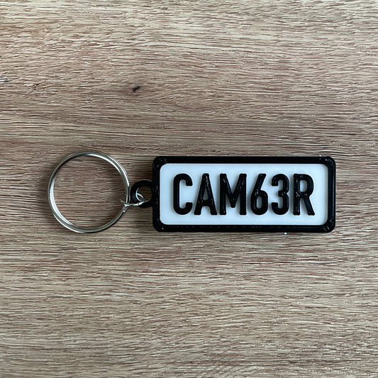 a picture of the camber keychain with the white background
