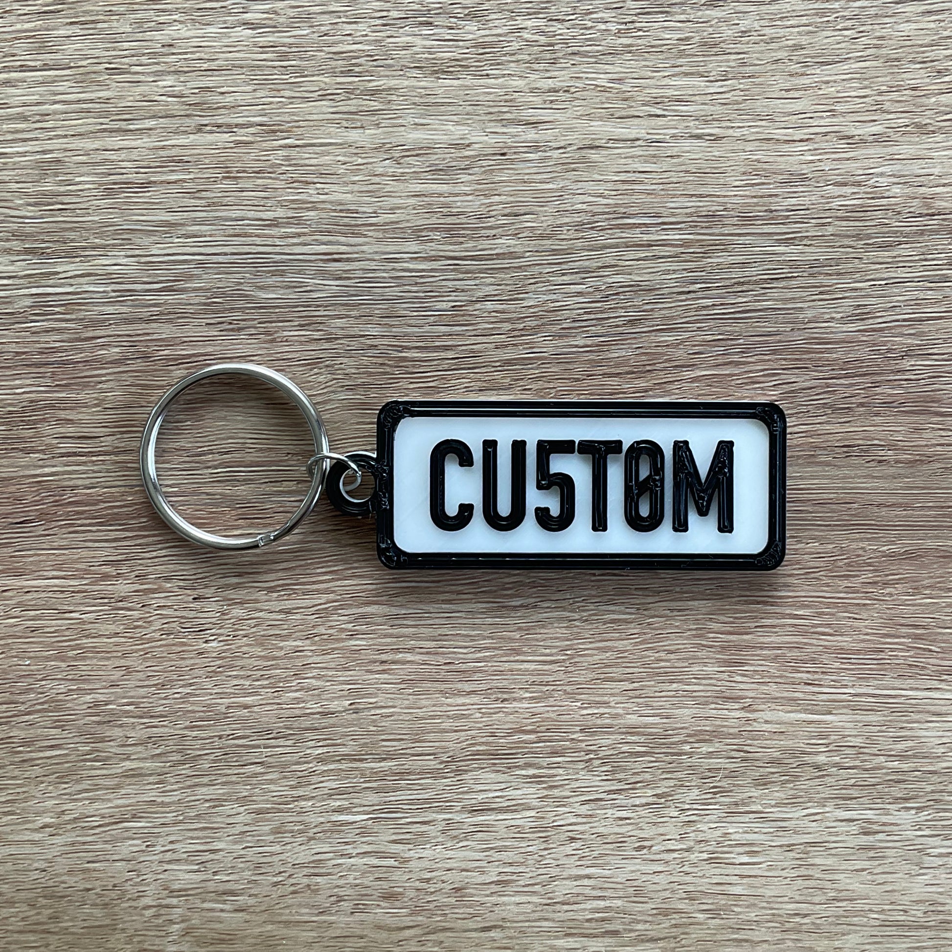 a picture of the custom keychain with the white background