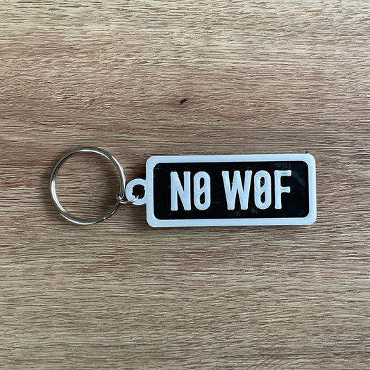 An image of the black No Warrant Of fitness Keychain.