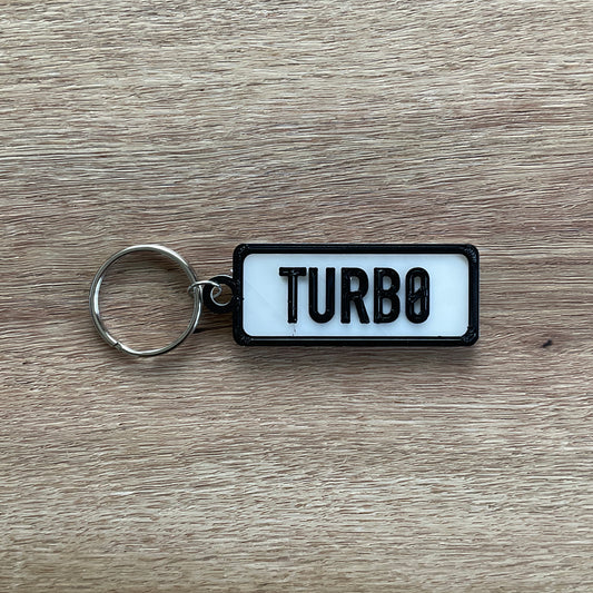 a picture of the turbo keychain with the white background.