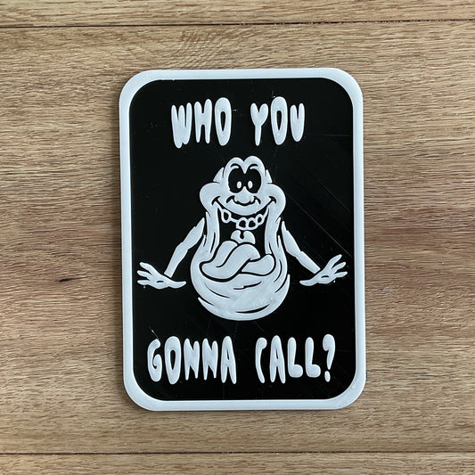 a picture of the who you gonna call sign in black